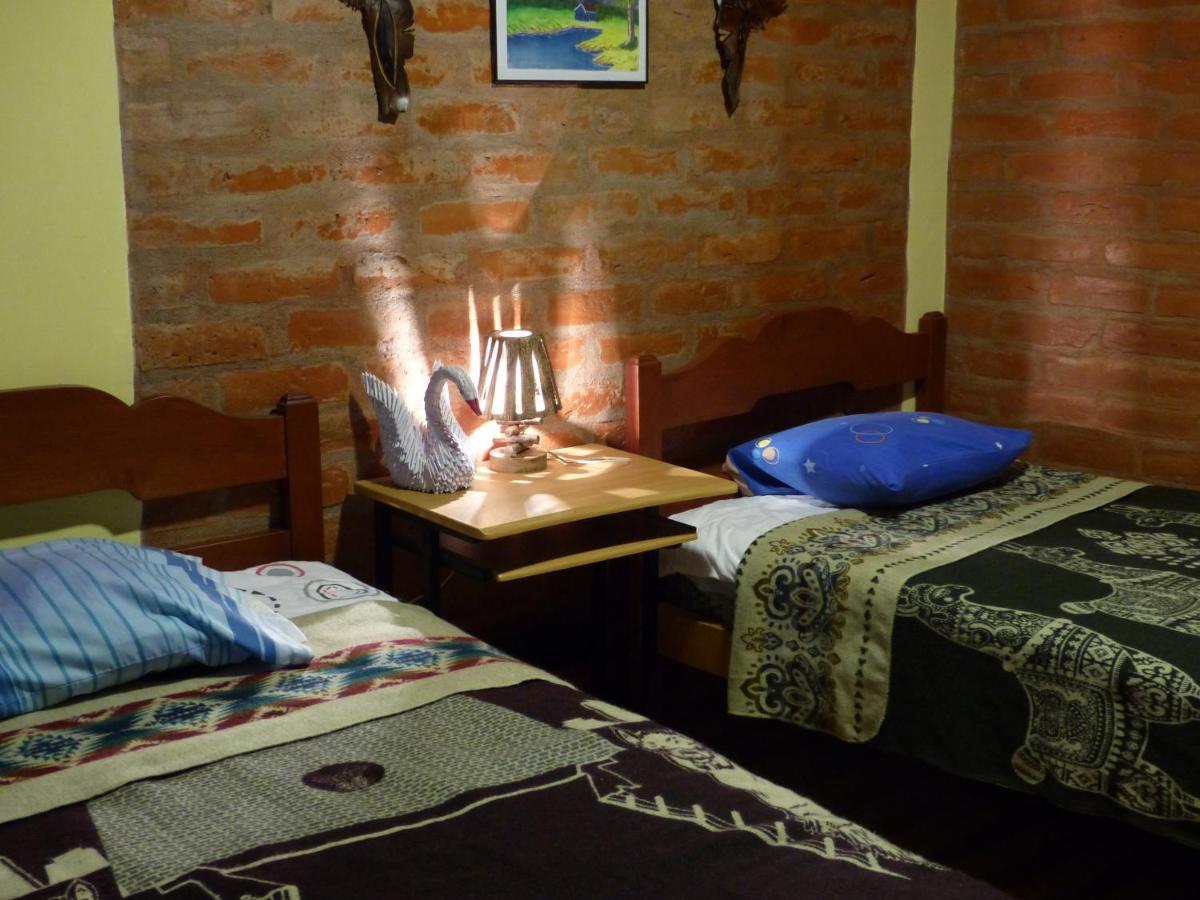 Hostal La Casa Amarilla City Baños Exterior foto